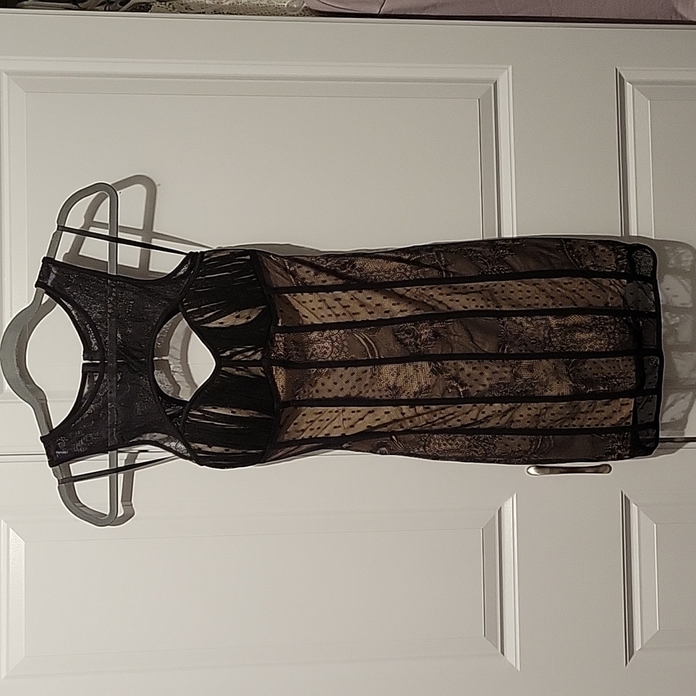Bebe black lace dress with nude base layer size XS